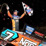 Tyler Courtney celebrating his second victory of the weekend Friday night at Volusia Speedway Park. (Jim Denhamer Photo)