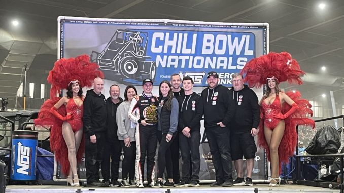 Christopher Bell with family and crew in victory lane after winning the Race of Champions during the 40th Chili Bowl Nationals. (Serena Dalhamer Photo)