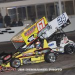 Colton Bettis (#61) inside of Dylan Reynolds (#24) Saturday at Showtime Speedway. (Jim Denhamer Photo)
