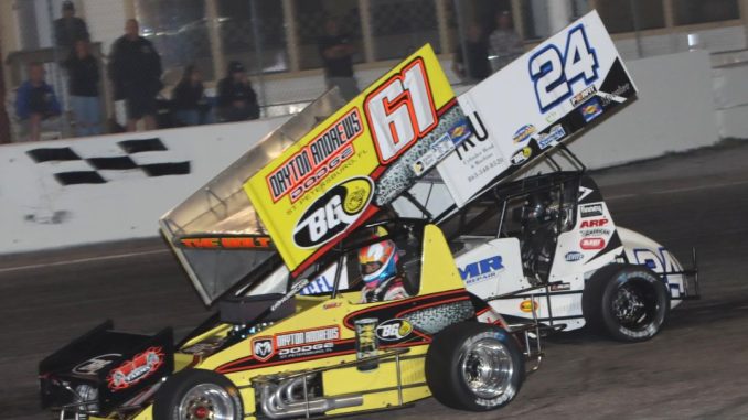 Colton Bettis (#61) taking the lead from Dylan Reynolds (#24) Saturday night at Showtime Speedway. (Jim Denhamer Photo)
