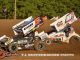 Brock Hallett (#5) racing with Jason Blonde (#10) Saturday night at Butler Motor Speedway. (T.J. Buffenbarger Photo)