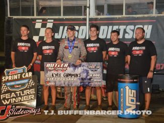 Kyle Cummins with his crew in victory lane Saturday night at Butler Motor Speedway. (T.J. Buffenbarger Photo)