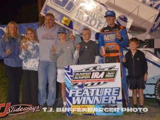 Clinton Boyles with Shannon Eifert and his family in victory lane Friday night at I-96 Speedway. (T.J. Buffenbarger Photo)