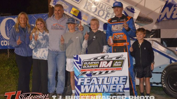 Clinton Boyles with Shannon Eifert and his family in victory lane Friday night at I-96 Speedway. (T.J. Buffenbarger Photo)