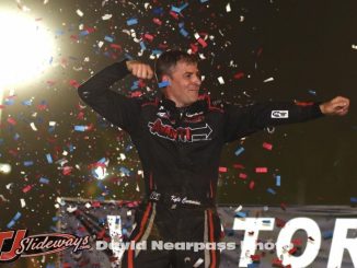 Kyle Cummins celebrates his triumph in Friday night's USAC NOS Energy Drink Indiana Sprint Week Presented by K & N Filters event at Putnamville's Lincoln Park Speedway. (David Nearpass Photo)