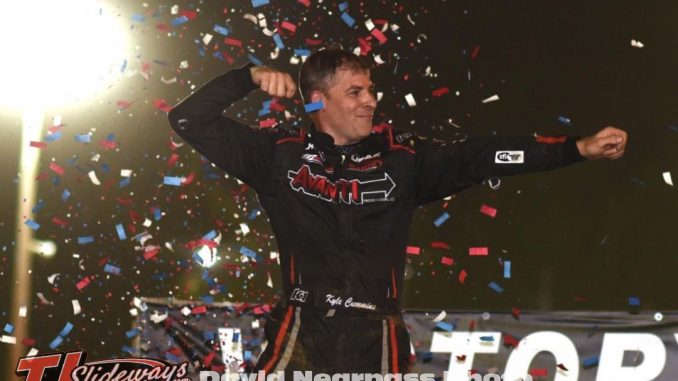 Kyle Cummins celebrates his triumph in Friday night's USAC NOS Energy Drink Indiana Sprint Week Presented by K & N Filters event at Putnamville's Lincoln Park Speedway. (David Nearpass Photo)