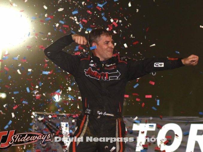 Kyle Cummins celebrates his triumph in Friday night's USAC NOS Energy Drink Indiana Sprint Week Presented by K & N Filters event at Putnamville's Lincoln Park Speedway. (David Nearpass Photo)