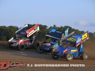 Devon Dobie (#23), Zane Devault (#14) and Dustin Daggett 9#85) racing three wide off turn two at I-96 Speedway. (T.J. Buffenbarger Photo)