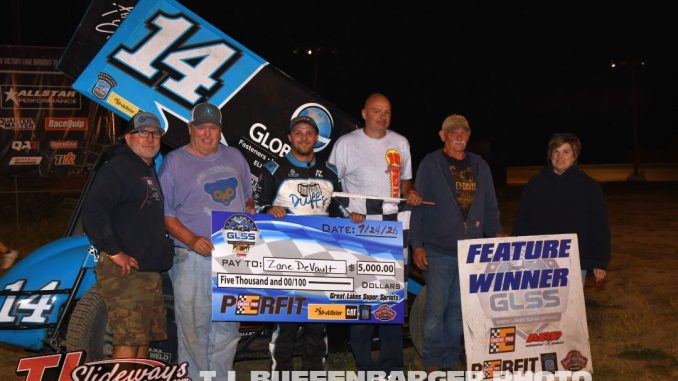 Zane Devault in victory lane with his family in crew after winning the GLSS feature event Friday night at I-96 Speedway. (T.J. Buffenbarger Photo)