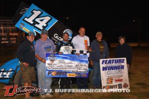 Zane Devault with his race team in victory lane at I-96 Speedway. (T.J. Buffenbarger Photo)