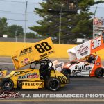 Jimmy McCune (#88) racing with Aaron Willison (#36) Saturday night at Berlin Raceway. (T.J. Buffenbarger Photo)