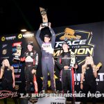 JoJo Helberg hoists the trophy after winning the second Race for the Million feature at Berlin Raceway. (T.J. Buffenbarger Photo)