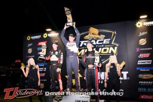 JoJo Helberg (Center) hoists the trophy while second place Kody Swanson (L) and Colton Bettis (R) share the podium after the second feature event Saturday at Berlin Raceway for the Race for the Million Series. (T.J. Buffenbarger Photo)