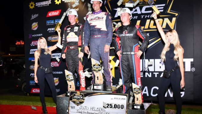 (L to R) Second place Kody Swanson, winner JoJo Helberg, and third place Colton Bettis after the second Race for the Million feature at Berlin Raceway. (T.J. Buffenbarger Photo)