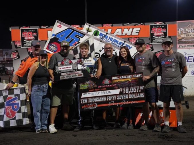 Rees Moran with his team in victory lane Sunday at Huset's Speedway. (Tylan Porath Photo)