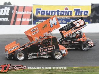 Brandon Carlson (#14) and Jeff Montgomery (#33J) racing for position Friday at Saratoga Speedway. (David Sink Photo)