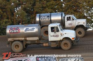 Butler Motor Speedway using their water trucks to roll in the racing surface on Saturday. (T.J. Buffenbarger Photo)
