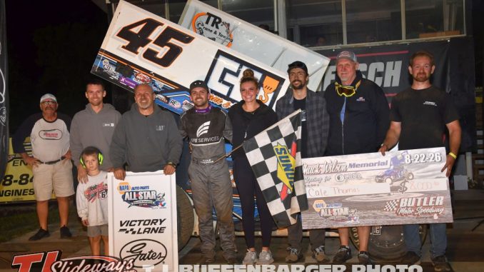 Cale Thomas with his race team in victory lane after winning the Chuck Wilson Memorial Saturday at Butler Motor Speedway. (T.J. Buffenbarger Photo)