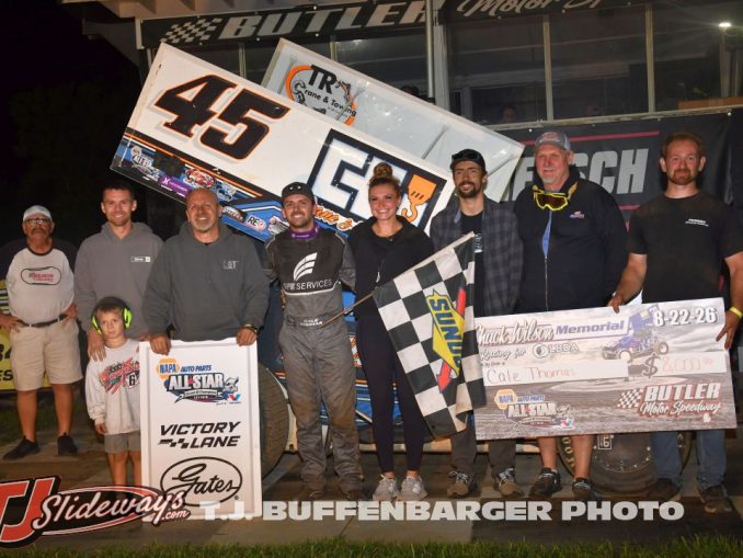 Cale Thomas with his race team in victory lane after winning the Chuck Wilson Memorial Saturday at Butler Motor Speedway. (T.J. Buffenbarger Photo)
