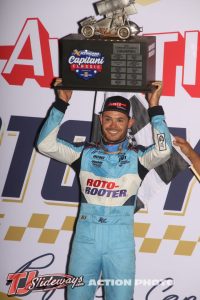 Kyle Larson with the Capitani Classic trophy in victory lane Sunday night at Knoxville Raceway. (T.J. Buffenbarger Photo)