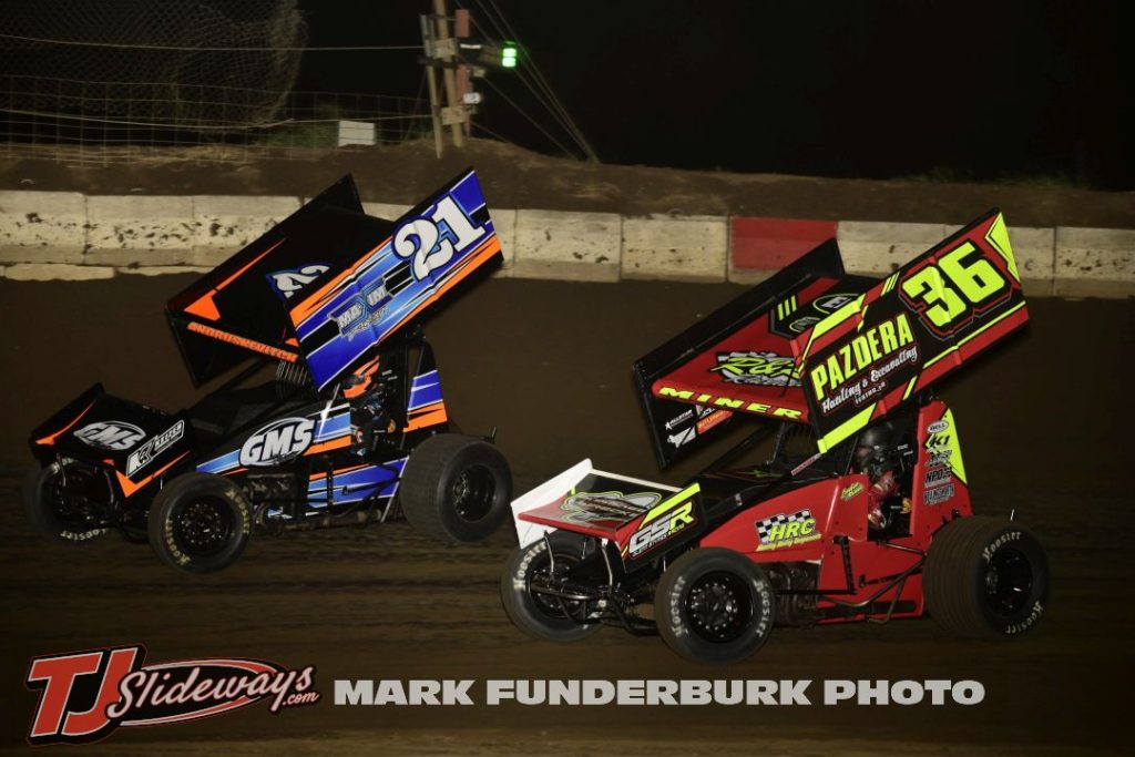 Aarik Andruskevitch (#21) racing with Landon Miner (#36) during the 305 sprint car feature Friday at Jacksonville Speedway. (Mark Funderburk Photo)