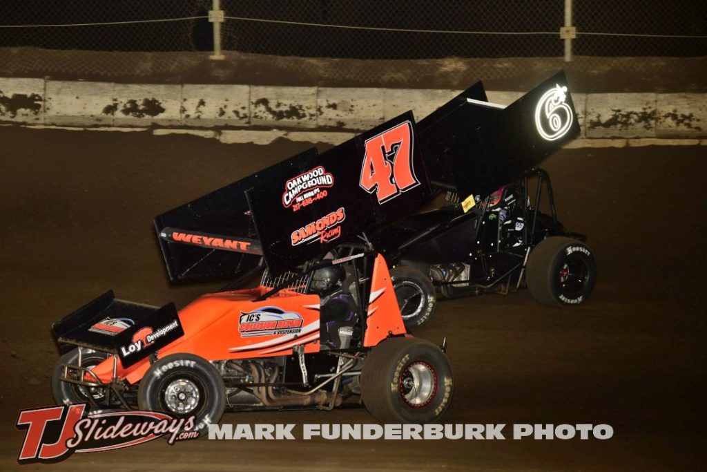 Korey Weyant (#47) racing with Zach Hampton (#6) Friday at Jacksonville Speedway. (Mark Funderburk Photo)