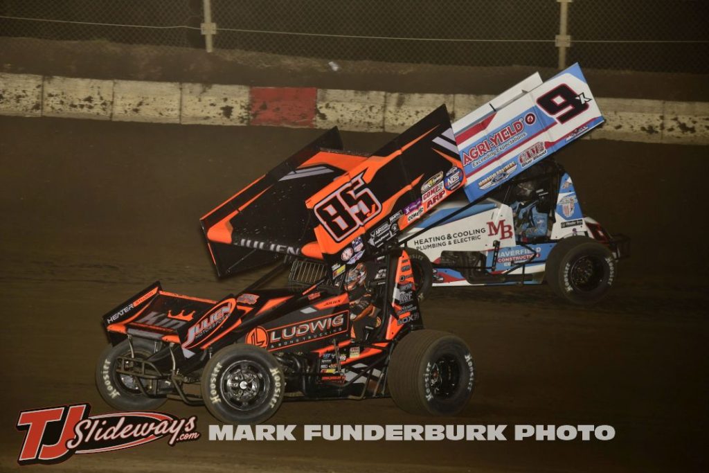 Logan Julien (#85) racing with Paul Nienhiser (#9) with the Interstate Racing Association Friday at Jacksonville Speedway. (Mark Funderburk Photo)