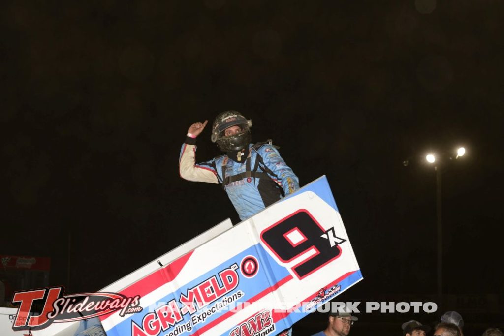 Paul Nienhiser celebrates his feature victory with the Interstate Racing Association Friday at Jacksonville Speedway. (Mark Funderburk Photo)
