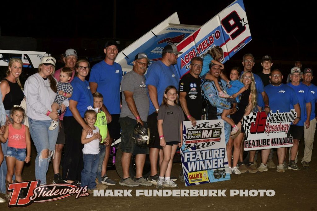 Paul Nienhiser with his family and crew after winning the feature event with the Interstate Racing Association Friday at Jacksonville Speedway. (Mark Funderburk Photo)
