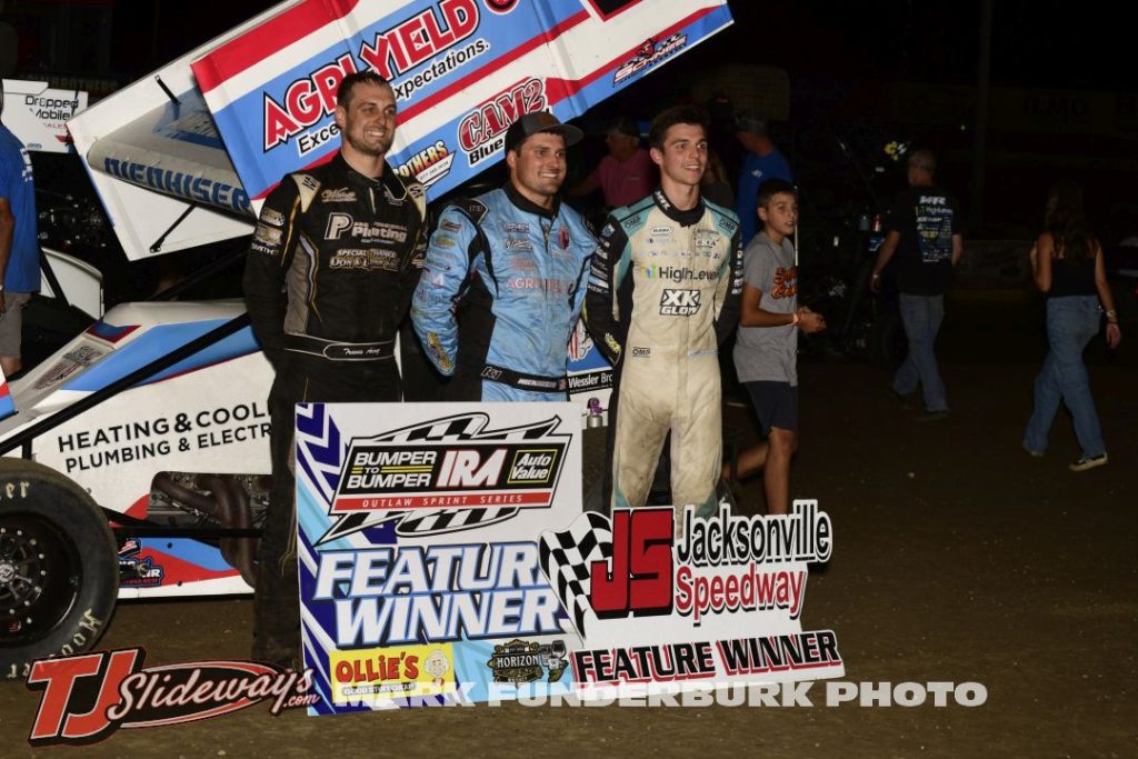(L to R) Second place Travis Arenz, winner Paul Nienhiser, and third place Will Armitage after the Interstate Racing Association feature Friday at Jacksonville Speedway. (Mark Funderburk Photo)