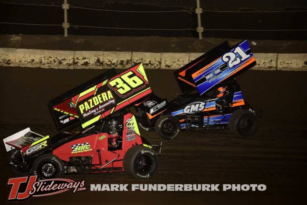 Aarik Andruskevitch (#21) racing with Landon Miner (#36) during the 305 sprint car feature Friday at Jacksonville Speedway. (Mark Funderburk Photo)