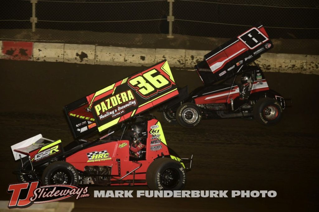 Landon Miner (#36) inside of B.J. Simmerman for the lead during the 305 sprint car feature at Jacksonville Speedway. (Mark Funderburk Photo)