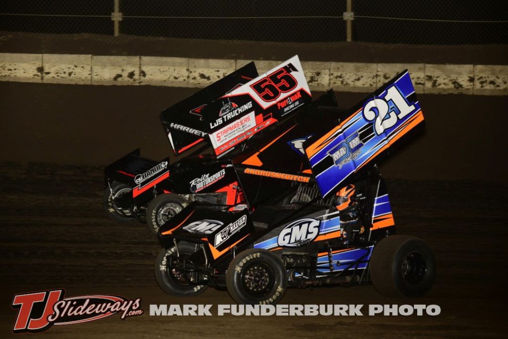 Hayden Harvey (#55H) racing with Aarik Andruskevitch (#21) Friday at Jacksonville Speedway. (Mark Funderburk Photo)
