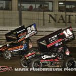 Christopher Thram (#24D) and Corey Day (#14) racing for position Wednesday night at Knoxville Raceway. (Mark Funderburk Photo)