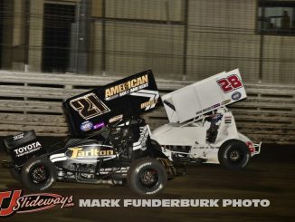 James McFadden (#21) racing with Jace Park (#28) for the lead Wednesday night at Knoxville Raceway. (Mark Funderburk Photo)