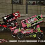 Cole Macedo (#2C) racing with Sheldon Haudenschild (#18) Wednesday night at the Knoxville Nationals. (Mark Funderburk Photo)
