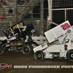 James McFadden (#21) racing with Jace Park (#28) for the lead Wednesday night at Knoxville Raceway. (Mark Funderburk Photo)