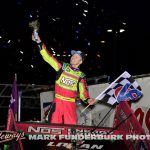 Sheldon Haudenschild after his last lap pass to win the feature event Wednesday night during the 65th Knoxville Nationals. (Mark Funderburk Photo)
