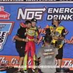 Sheldon Haudenschild and Kyle Ripper celebrate before speaking with Wade Aunger after winning the feature event Wednesday night at Knoxville Raceway. (Mark Funderburk Photo)