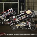 Brent Marks (#19) racing with Tanner Thorson (#88) Saturday during the finale of the 65th Knoxville Nationals. (Mark Funderburk Photo)