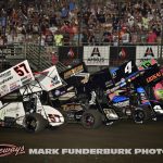 The parade lap for the 65th Knoxville Nationals finale with Kyle Larson (#57), James McFadden (#21T), Kasey Kahne (#4), and Sheldon Haudenschild (#4). (Mark Funderburk Photo)