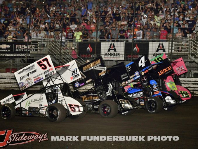 The parade lap for the 65th Knoxville Nationals finale with Kyle Larson (#57), James McFadden (#21T), Kasey Kahne (#4), and Sheldon Haudenschild (#4). (Mark Funderburk Photo)