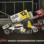 Cole Macedo (#2C) racing with Tanner Holmes (#13) Saturday during the 65th Knoxville Nationals. (Mark Funderburk Photo)