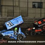 Parker Price-Miller (#71) racing with David Gravel (#2) during the finale of the 65th Knoxville Nationals finale. (Mark Funderburk Photo)