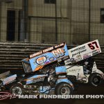 Daryn Pittman (#69K being lapped by Kyle Larson (#57) during the 65th Knoxville Nationals. (Mark Funderburk Photo)