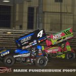 Kasey Kahne (#4) racing for second position with Sheldon Haudenschild (#18) during the 65th Knoxville Nationals. (Mark Funderburk Photo)