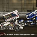 Logan Schuchart (#1S) racing with Chase Dietz (#23) during the Saturday finale of the 65th Knoxville Nationals. (Mark Funderburk Photo)