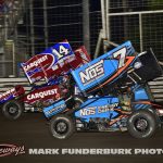 Rico Abreu (#14) racing for position with Tyler Courtney (#7) Saturday during the finale of the 65th Knoxville Nationals. (Mark Funderburk Photo)