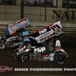 Daryn Pittman (#69K) racing with Brent Marks (#19M) Thursday at Knoxville Raceway. (Mark Funderburk Photo)