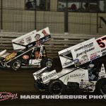 Tasker Phillips (#1TAZ) racing with Kyle Larson (#57) Thursday at Knoxville Raceway. (Mark Funderburk Photo)